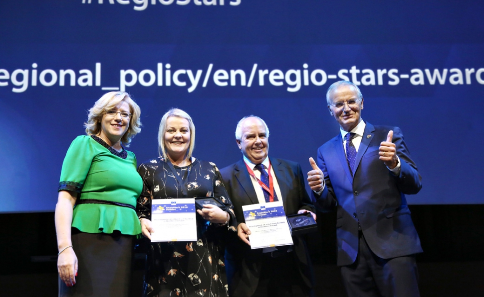 From left to right are Corina Crețu, EU Commissioner for Regional Policy, Maeve Hamilton, Head of the Managing Authority, European Fund Management, Charles Hamilton, Head of EU Programmes, InvestNI and Lambert van Nistelrooij, MEP
